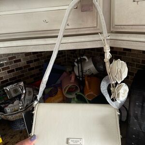 Kate Spade Cream Crossbody Bag with Floral Accent